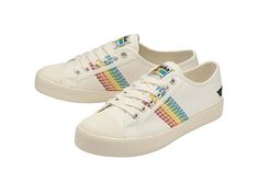 Gola Coaster Rainbow Stitch - Women's Shoes : White/Multi : Step up your style with classic canvas style Gola Coaster Rainbow Stitch sneakers. Fabric upper, lining, and insole. Round-toe silhouette. Lace-up closure. Branding on the tongue and at the back. Synthetic outsole. Imported. Weight of footwear is based on a single item, not a pair. Rainbow Colored Sneakers With Rubber Sole For Spring, Rainbow Casual Sneakers For Spring, Trendy White Textile Sneakers, Rainbow Colored Sporty Sneakers For Spring, Trendy Multicolor Canvas Sneakers, White Mid-top Canvas Shoes, Multicolor Canvas Sneakers With Laces, Spring Rainbow Sneakers With Rubber Sole, Sporty Multicolor Cotton Sneakers