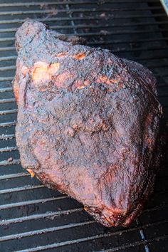 a steak is cooking on the grill with it's side being grilled and ready to be eaten