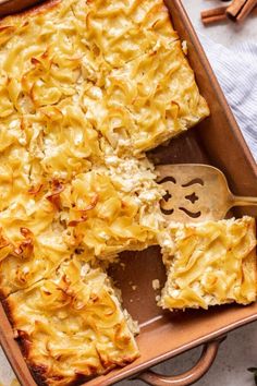 a casserole dish filled with macaroni and cheese