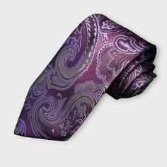 Treat yourself with a new pattern and splash of color to your look with this unique tie set. 100% Silk Handmade Package Includes: Tie, Pocket Square & Cufflinks. Length: 59" Width: 3.34" Warm iron if needed We offer FREE International Shipping World Wide! Classic Purple Adjustable Suit And Tie Accessories, Formal Purple Tie, Purple Ties As Gifts, Elegant Multicolor Ties For Father's Day, Multicolor Adjustable Tie For Formal Occasions, Purple Paisley, Unique Ties, Cufflink Set, Tie Set