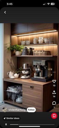 a coffee maker and some cups on a shelf