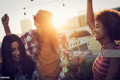 group of young people dancing in the city at sunset stock - fotografie