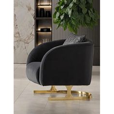 a black chair with gold legs in front of a book shelf and potted plant