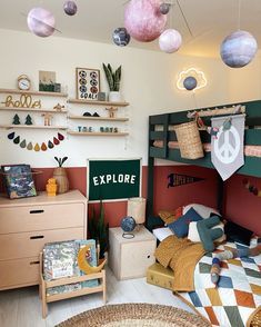 a child's bedroom with lots of toys and decor