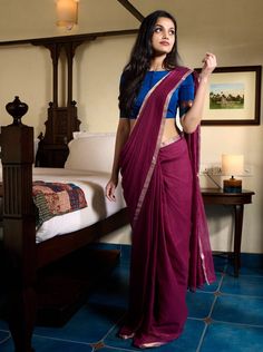 This kota saree is an Purple shade. Pairs beautifully with a Blue,  Green or pink blouse. Purple Cotton Silk Saree With Unstitched Blouse, Blue Cotton Pre-draped Saree, Pink Cotton Saree With Unstitched Blouse, Purple Cotton Silk Saree For Navratri, Diwali Blouse With Sheer Dupatta For Puja, Elegant Cotton Saree Blouse Piece, Sheer Dupatta Blouse For Diwali Puja, Elegant Festive Cotton Saree, Purple Blouse Piece For Puja