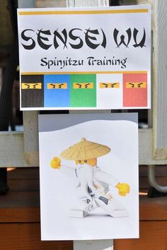 a sign that is on the side of a wooden fence saying sense wu spinitizu training