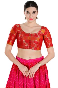 Buy Women's Red Jacquard Readymade Saree Blouse Online Elegant Fitted Jacquard Blouse, Fitted Brocade Top With Unique Design, Brocade Top For Party And Festivals, Fitted Brocade Top With Self Design, Padded Blouse Tops For Celebration, Fitted Red Blouse For Celebration, Fitted Red Brocade Choli, Red Fitted Choli For Formal Occasions, Fitted Red Blouse