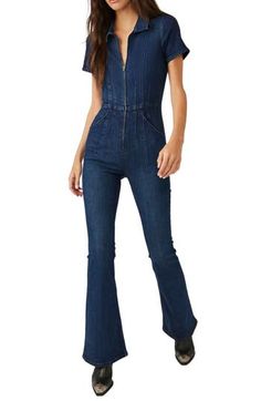 Rock a modern casual-cool vibe in this stretchy denim jumpsuit designed with a versatile front zip and leg-elongating flared hems. 63" length; 34" inseam; 22" leg opening (size Medium) Spread collar Short sleeves 92% cotton, 6% polyester, 2% elastane Machine wash, tumble dry Made in Turkey Fitted Flare Jeans With Zipper For Fall, Fitted Flare Jeans With Zipper Closure For Fall, Spring Fitted Flare Jeans With Zipper Closure, Fitted Flare Jeans With Zip Fly, Fitted Wide Leg Dark Wash Denim Jumpsuit, Fitted Denim Flare Jeans With Zipper, Fitted Denim Flare Jeans With Zipper Closure, Fitted Casual Flare Jeans With Zipper, Fitted Flare Jeans With Zipper Closure