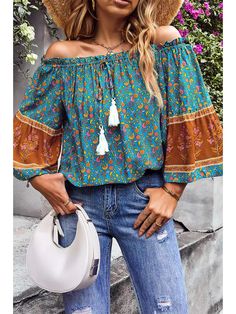 Experience the perfect balance of style and comfort with our Jamie Off Shoulder Long Sleeve Drawstring Floral Top. The off-shoulder design adds a touch of elegance, while the adjustable drawstring allows for a personalized fit. Make a statement with the vibrant floral print and feel confident in every step. Bohemian Long Sleeve Off-shoulder Top For Vacation, Spring Multicolor Tops With Drawstring, Casual Green Off-shoulder Summer Top, Bohemian Long Sleeve Off-shoulder Top, Blue Long Sleeve Off-shoulder Top For Summer, Casual Long Sleeve Off-shoulder Top For Beach, Bohemian Off-shoulder Long Sleeve Top, Blue Off-shoulder Long Sleeve Top For Summer, Bohemian Off-shoulder Top For Beach