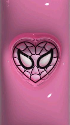 a pink phone case with an image of spiderman's face in the center