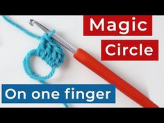 an orange crochet hook with the words magic circle on it next to a red crochet hook