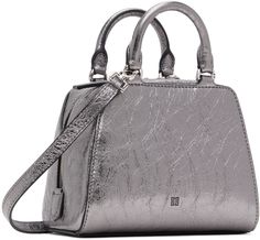 Structured and laminated grained lambskin top handle bag in gunmetal tone. · Twin rolled carry handles · Adjustable and detachable crossbody strap · Logo stamp at face and back face · Two-way zip closure · Card slot at interior · Canvas lining · Logo-engraved silver-tone hardware · H5.5 x W6.5 x D3.5 Supplier color: Silver grey Luxury Silver Satchel For Shopping, Silver Satchel With Double Handle, Silver Satchel With Double Handle And Top Carry Handle, Silver Crossbody Satchel With Top Carry Handle, Silver Top Handle Shoulder Bag With Gunmetal Hardware, Evening Top Handle Satchel With Gunmetal Hardware, Luxury Metallic Silver Bag For Formal Occasions, Modern Silver Top Handle Satchel, Evening Satchel With Gunmetal Hardware And Double Handle