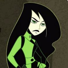 an animated character with black hair and green eyes, standing in front of a dark background