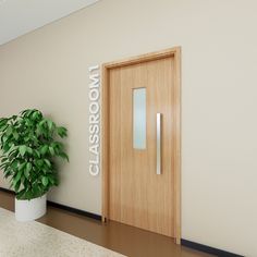 a plant is next to a door in an office