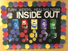 the inside out bulletin board is decorated with colorful paper circles and cartoon character stickers