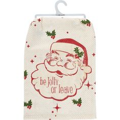 a white towel with a santa clause on it and holly leaves around the edges that says, be holly or leave