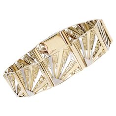 Bracelet in 18 karat yellow and white gold, eagle and rhinoceros heads hallmark. Taking up the characteristic patterns of its time, this Art Deco bracelet is formed of a suite of 10 rectangular patterns articulated between them and decorated with patterns representing Greeks in filigree and a pattern in fan in white gold alternated with yellow gold. The ratchet clasp with safety "8" is hidden in the pattern. Length : 18.5 cm approximately, width : 15 mm, thickness : 2.3 mm approximately, inner circumference : 18 cm approximately. Total weight of the jewel : 26,9 g approximately. Authentic antique jewel - French work of the years 1925. Our opinion : a magnificent and rare Art Deco bracelet. Specialized in antique and creation jewelry since 1975, we deliver all our jewel with their certifica Bracelet Art, Art Deco Bracelet, Gold Eagle, Antique Bracelets, White Gold Bracelet, Gold Art Deco, Retro Jewelry, Gold Art, Link Bracelets