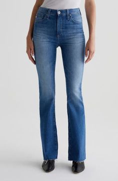 Keep it casual and cool in mid-rise, full-length bootcut jeans that hug your figure through the thighs and end in fraying hems. 19 1/2" leg opening Zip fly with button closure Five-pocket style 98% cotton, 2% elastane Machine wash, tumble dry Imported Fitted Classic Flare Jeans With Frayed Hem, Fitted Flares With Frayed Hem And Straight Leg, Fitted Mid-rise Flares With Frayed Hem, Mid Rise Bootcut Jeans, Nordstrom Store, Free Fabric, Anniversary Sale, Jeans Pants, Bottoms Pants