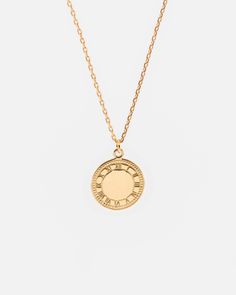 This simply elegant Roman clock pendant necklace is handcrafted in vermeil, a thick 18K gold layer on solid 925 sterling silver. It is sturdy for everyday wear. This versatile necklace can be worn beautifully alone or layered with other necklaces. ___________________________________ D E T A I L S : ▪ Disc Diameter - 15mm▪ Model Wears - 50cm/19.7 Inches▪ 18K Gold Vermeil Necklace▪ Base Metal - Solid 925 Sterling Silver▪ Hypoallergenic▪ Shipped from Berlin▪ Orders to the US - No Customs Fees Upon Timeless Round Charm Necklace With Delicate Chain, Timeless Gold Charm Necklaces, Timeless Charm Necklace With Delicate Chain, Timeless Gold Charm Necklace For Everyday, Timeless Everyday Gold Charm Necklace, Yellow Gold Timeless Charm Necklace For Everyday, Timeless Yellow Gold Charm Necklace For Everyday, Everyday Timeless Yellow Gold Charm Necklace, Classic Tarnish Resistant Medallion Necklace