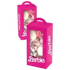 two pink boxes with white and pink designs on the front, one is for barbie