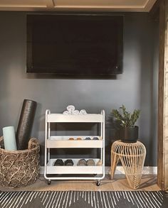 there is a shelf with shoes on it in the room