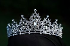 This stunning Tiara Crown is crafted from tarnish resistant zinc alloy and intricately decorated with crystals to create an elegant look ideal for any special occasion, including weddings, quinceañeras, birthdays, pageants and more. **WEARING YOUR CROWN OR TIARA** Most pieces are adjustable by carefully bending and separating the ends to desired fit. Loops are featured in the design for securing to hair with bobby pins or clips **SHIPPING** All orders are sent within 24 hours from Florida, USA. Crown Birthday, Tiara Bridal, Crystal Tiara, Tiara Crown, Crystal Tiaras, Bridal Crown, Florida Usa, Bridal Tiara, Tiaras And Crowns