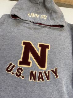 US United States Navy Classic Gray Champion Hoodie Size Mens Small Quality Stitched USA America Fast shipping. We ship same or next day USPS priority mail We are a small family business and we appreciate your support, Godspeed ! Badgers Logo, Grey Champion Hoodie, Go Navy, College Football Teams, Classic Gray, Champion Brand, 2020 Fashion Trends, Football Photos, Football And Basketball