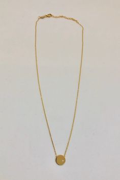 "This darling 14 karat gold necklace features a beveled chain and a brightly finished disk with one diamond. It is so easy to wear, you may never take it off! The chain is so versatile! It has a 2\" chain extender that allows the necklace to be adjusted 16\"-18\". Diamond specifications: I1 clarity/G/H color Total weight 0.8 pt. Lobster clasp is 14kt gold Disk is 9.7 mm in diameter I also feature a very similar necklace that is made of 14 goldfill for a fraction of the price. Look for it in my E 14k Gold Solitaire Necklace With Cable Chain, 14k Gold Round Pendant Chain Necklace For Anniversary, Gold Solitaire Necklace With Delicate Chain And Round Pendant, Gold Solitaire Necklace With Cable Chain For Gifts, 14k Gold Anniversary Chain Necklace With Round Pendant, Gold Solitaire Necklace With Round Pendant And Cable Chain, Diamond Necklace With Round Gold Chain For Gift, Yellow Gold Solitaire Necklace With Cable Chain For Gift, Yellow Gold Solitaire Necklace With Adjustable Chain