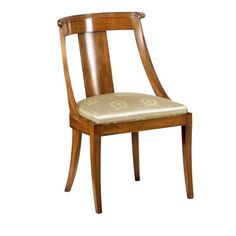 a wooden chair with a beige upholstered seat and back cushion on white background