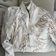 Vici Fringe Suede Jacket Size Large But Could Fit Medium New With Tags Perfect Little Western Outfit Purchased For My Engagement Photos But Ended Up Wearing Something Different But So Cute! Cream Fringe Outerwear For Spring, Spring Cream Outerwear With Fringe, Cream Fringe Outerwear For Winter, Chic Beige Outerwear With Fringe, Spring Cream Fringe Outerwear, Fitted Long Sleeve Outerwear With Fringe, White Leather Jacket Outfit, Beige Long Sleeve Outerwear With Fringe, White Fringe Leather Jacket