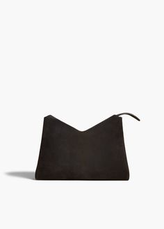 A lightweight zip-top bag with sculptural folds along the sides. Wear across the body on the removable strap or carry as a clutch. Body On, Leather Care, Zip Top, The Body, Black Suede, Crossbody Bag, How To Wear, Black