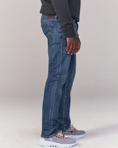 A classic silhouette that's straight from top to bottom with refined details and built-in stretch for superior comfort and flexibility. Fitted Jeans For Business Casual, Classic Straight Fitted Bottoms, Classic Fitted Straight Bottoms, Fitted Medium Wash Bottoms With Welt Pockets, Casual Fitted Jeans With Welt Pockets, Fitted Bottoms With Welt Pockets In Medium Wash, Fitted Straight Leg Jeans For Business Casual, Fitted Jeans With Welt Pockets And Standard Cut Leg, Fitted Dark Wash Bottoms With Straight Hem