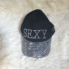 Nwt. Also Extra Bag Of Crystals If Needed.. Osfa. Baseball Style. Adjustable Strap. Sexy On Front And Las Vegas On Side. Trendy Silver Summer Hat, Trendy Adjustable Silver Hat, Trendy Silver Adjustable Hat, Trendy Party Hats With Rhinestones, Trendy Silver Party Hat, Trendy Rhinestone Party Hats, Bag Of Crystals, Baseball Caps, Black Silver