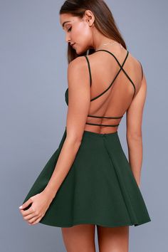 Lulus Exclusive! The Lulus Believe in Love Forest Green Backless Skater Dress will make a romantic out of you! Medium-weight stretch knit shapes a princess-seamed bodice, with a plunging neckline, and strappy, open back. Fitted waist flares into a flirty skater skirt. Hidden back zipper. Fitted Mini Dress With Tie Back And Sweetheart Neckline, Fitted Backless Dress With Sweetheart Neckline And Tie Back, Fitted Backless Dress With Tie Back And Sweetheart Neckline, Fitted Backless Mini Dress With Straps, Fitted Backless Dress With Strappy Back For Spring, Fitted Green Mini Dress With Back Zipper, Fitted Spring Backless Dress With Strappy Back, Fitted V-neck Backless Dress With Crisscross Straps, Fitted Flirty Backless Dress With Straps