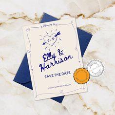 a blue and white save the date card with an orange wax stamp on it next to a paper flower