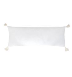 a white pillow with tassels on it