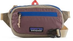 Stowing into its own pocket when not in use and expanding to carry everyday essentials  the Patagonia Ultralight Black Hole Mini hip pack is made from extremely lightweight yet tough fabric. Functional Brown Travel Accessories, Patagonia Functional Everyday Bag, Patagonia Nylon Travel Bag, Patagonia Nylon Bag For Outdoor, Functional Patagonia Travel Bags, Functional Patagonia Outdoor Bags, Casual Bag With Functional Pockets For Camping, Functional Brown Bag For Camping, Functional Brown Bags For Camping