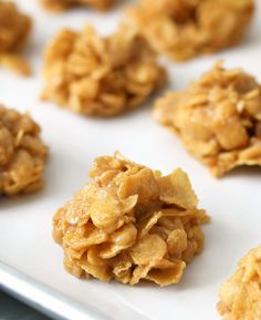 some cookies are sitting on a white plate and ready to be eaten by someone else