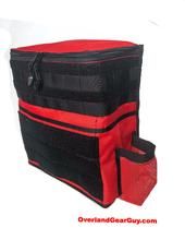 a red and black cooler bag sitting on top of a white background