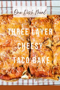 there is a square pizza with cheese and sauce on it that says, three layer cheesy taco bake