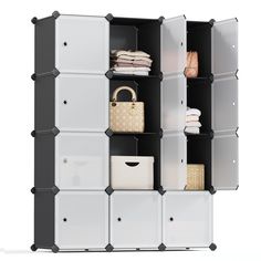 an open storage unit with several bins and baskets on it's sides, all in black and white