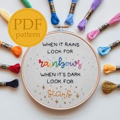 a cross stitch pattern with the words when it rains look for rainbows, then it's dark look for stars