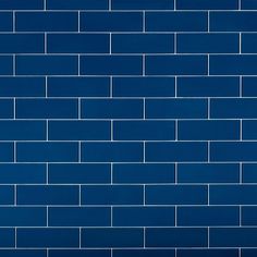 a blue brick wall with white lines on it