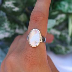 Material: Sterling silver - Mother of pearl shell Size Guide included as a photograph  Free UK first class postage Eco friendly packaging As all of our natural stones are created by Mother Nature, each stone is unique in appearance, so may look different from the stone photographed. Based in Dorset, UK Classic White Oval Moonstone Ring, White Oval Opal Ring With Polished Finish, Classic Oval Opal Ring Stamped 925, Oval Silver Opal Ring Stamped 925, Silver Oval Opal Ring Stamped 925, Classic Silver Oval Moonstone Ring, White Opal Ring Stamped 925, White Oval Hallmarked Rings, Dorset Uk