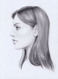 a pencil drawing of a woman's profile with her hair pulled back to the side