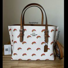 100% Authentic Brand New With Tags Bag Comes In Original Packaging Ck373 Rainbow Mollie 25 Chalk Multi And Silver Hardware Approximate Measurements: 11”Top, 10″Bottom (L) X 7.5″ (H) X 4″ (W) Handles With 6" Drop (Adjustable) Long Strap Included Coach Mollie, Taupe Purse, Red Satchel, Vintage Coach Bags, Leather Satchel Handbags, Satchel Tote Bag, Leather Fanny Pack, Bags Coach, Black Leather Purse