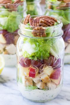 salad in a jar with pecans on the side