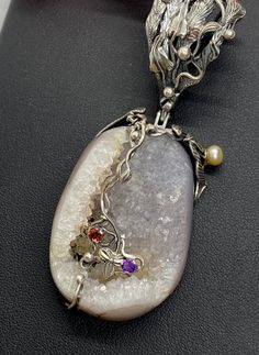 "UNIQUE DRUZY PENDANT Hand-made Sterling Silver , 24 k Gold. Stones used: Druzy, Pearls, Garnet, Amethyst. Height - 78mm, Width - 30mm Unique Handcrafted One-of a-kind Design Pendant Each Piece of Jewelry in my Collection is Absolutely One of a Kind! When you start wearing a piece of my jewelry you will fall in love with it more and more each day and feel that good Energy and Love that I pass into it while creating this piece of Art. A piece of Art created for you to be inspired and love it thro Handmade Luxury Custom Necklace, Artistic Pendant Necklace With Unique Design, Luxury Handmade Oval Pendant Necklaces, Handmade Oval Pendant Necklaces For Formal Occasions, Handmade Formal Necklaces With Oval Pendant, Handmade Pendant Necklace For Formal Occasions, Handmade Fusion Style Formal Necklace, Luxury Handmade Jewelry For Art Collection, Formal Fusion Handmade Necklaces