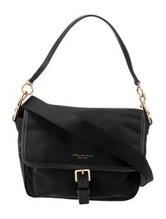 Tory Burch Shoulder BagBlack NylonGold-Tone HardwareLeather TrimFlat Handle & Single Adjustable Shoulder StrapLeather Trim Embellishment & Single Exterior PocketNylon Lining & Dual Interior PocketsSnap & Buckle Closures at Front Nylon Shoulder Bag, Work Bags, Saint Laurent Bag, Designer Gifts, Accessories Jacket, Bag Handle, Chanel Shoes, Christian Louboutin Shoes, Sweater Accessories