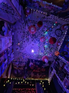 an overhead view of a room decorated with lights and decorations on the walls, ceiling